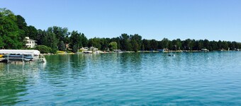 Torch Lake Village Cozy Cottage with private dock