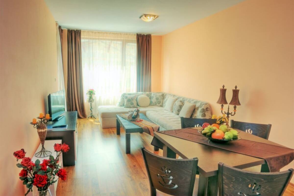 Apartamento estándar, vistas a la montaña | Sala de estar | Una televisión de pantalla plana
