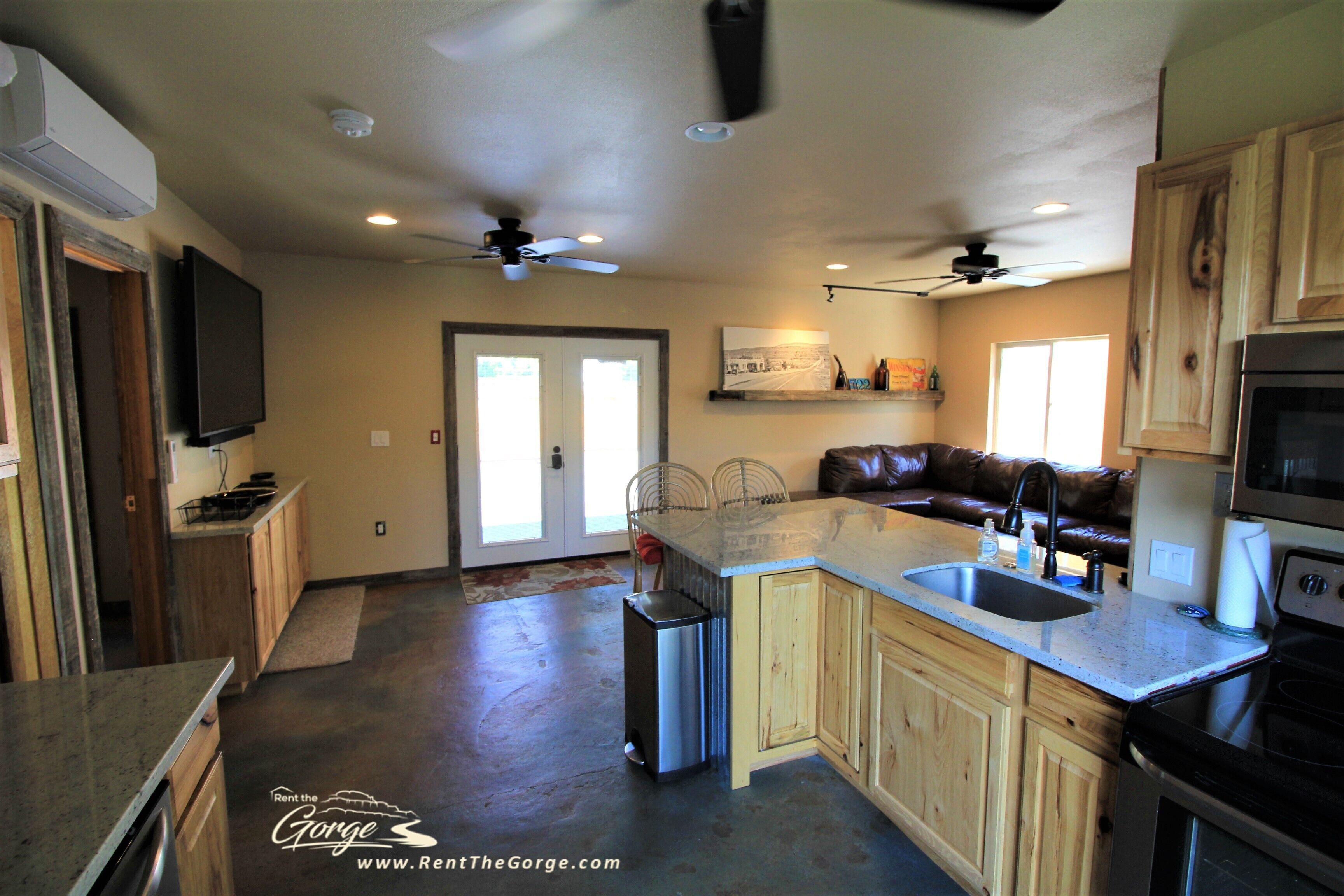 Outdoor kitchen with grill and professional griddle