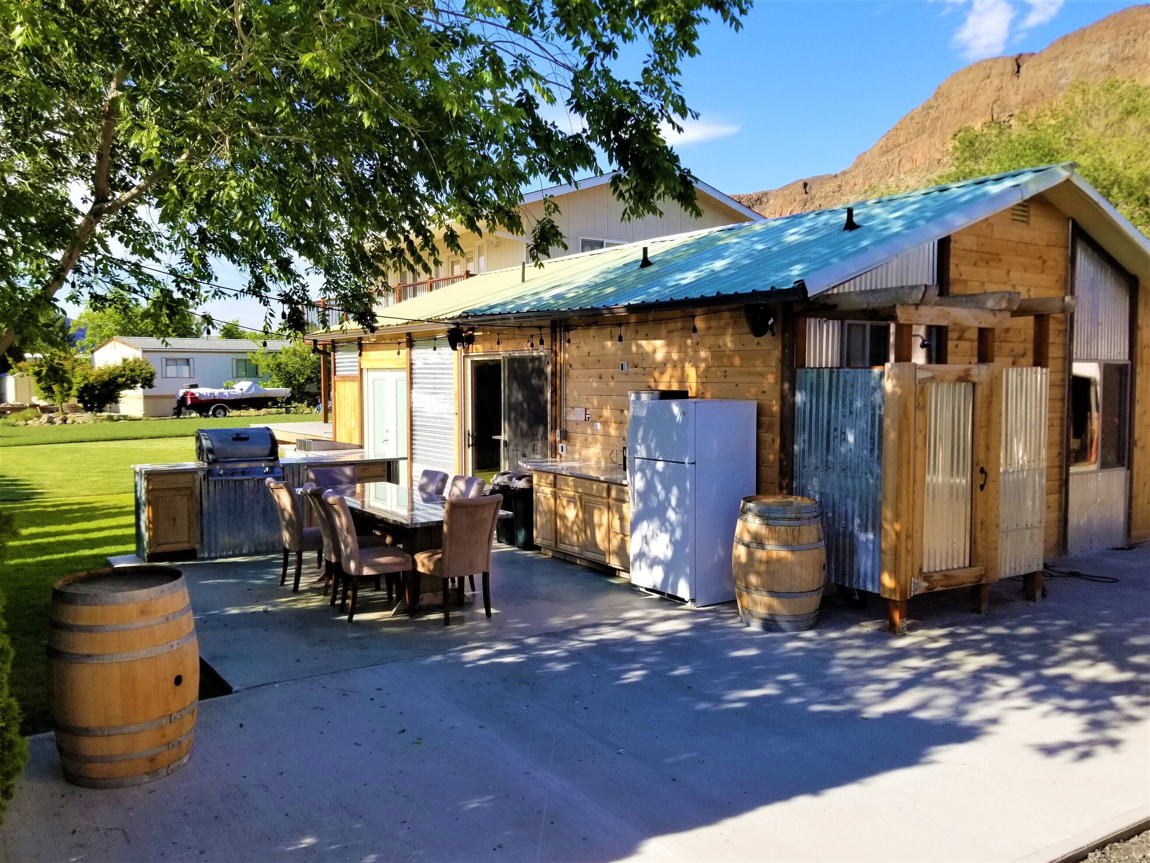 Outdoor kitchen with grill and professional griddle