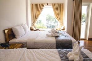 Family Double Room, 2 Queen Beds, Balcony, Sea View | 1 bedroom, Select Comfort beds, minibar, individually furnished - Mui Ne Beach Hotel (Phan Thiet)