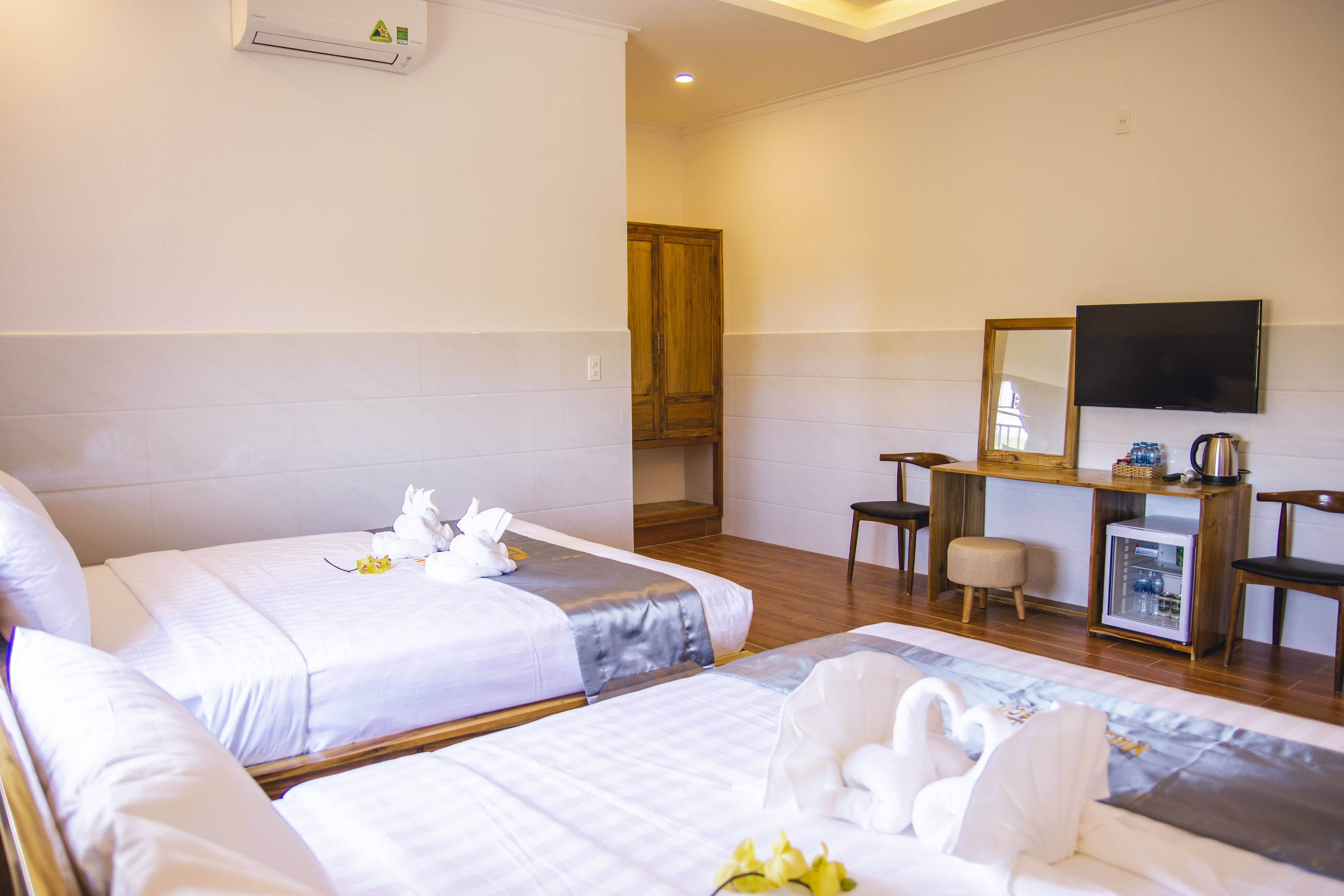 family double room, 2 queen beds, private bathroom, garden view | 1 bedroom, select comfort beds, minibar, individually furnished