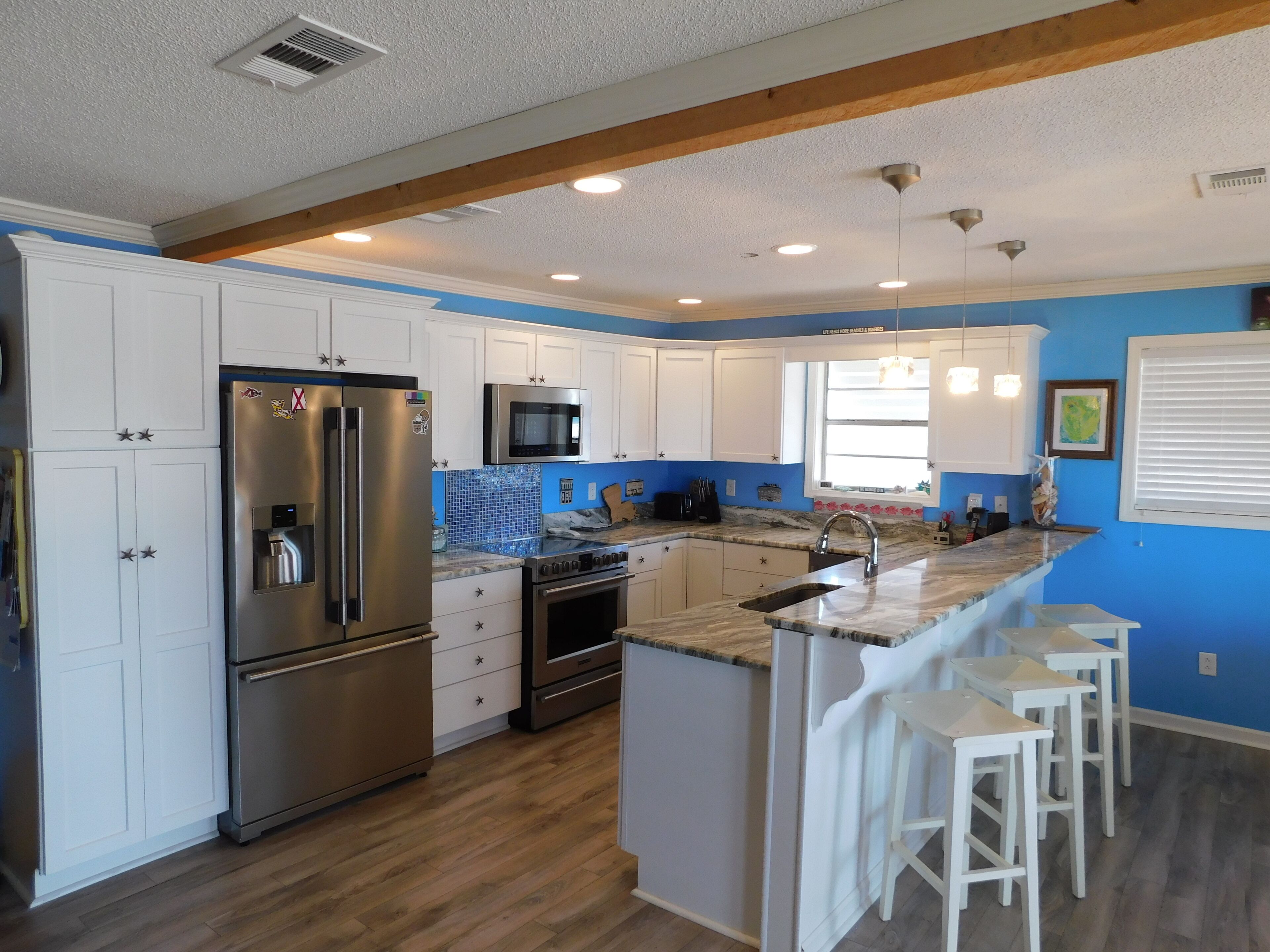 Steps Away from Sugar White Sand from this 2 bedroom/2 bath Family Beach Home