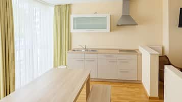 Apartment, 2 Bedrooms | Private kitchen | Full-sized fridge, microwave, stovetop, dishwasher