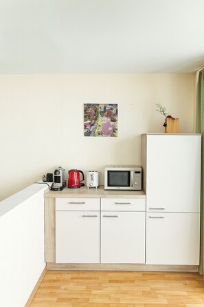 Apartment, 2 Bedrooms | Private kitchen | Full-sized fridge, microwave, stovetop, dishwasher