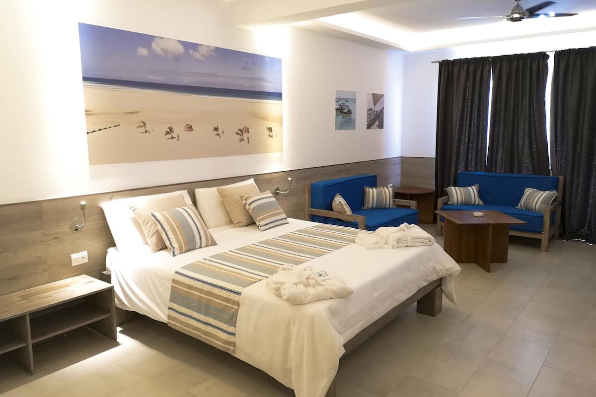 junior suite | 1 bedroom, minibar, in-room safe, desk