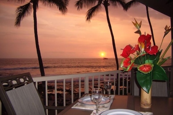 Watch the cruise ship sail into the sunset while enjoying dinner on the lanai.