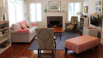Smart TV, fireplace, books