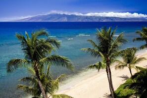 On the beach, sun-loungers, beach towels