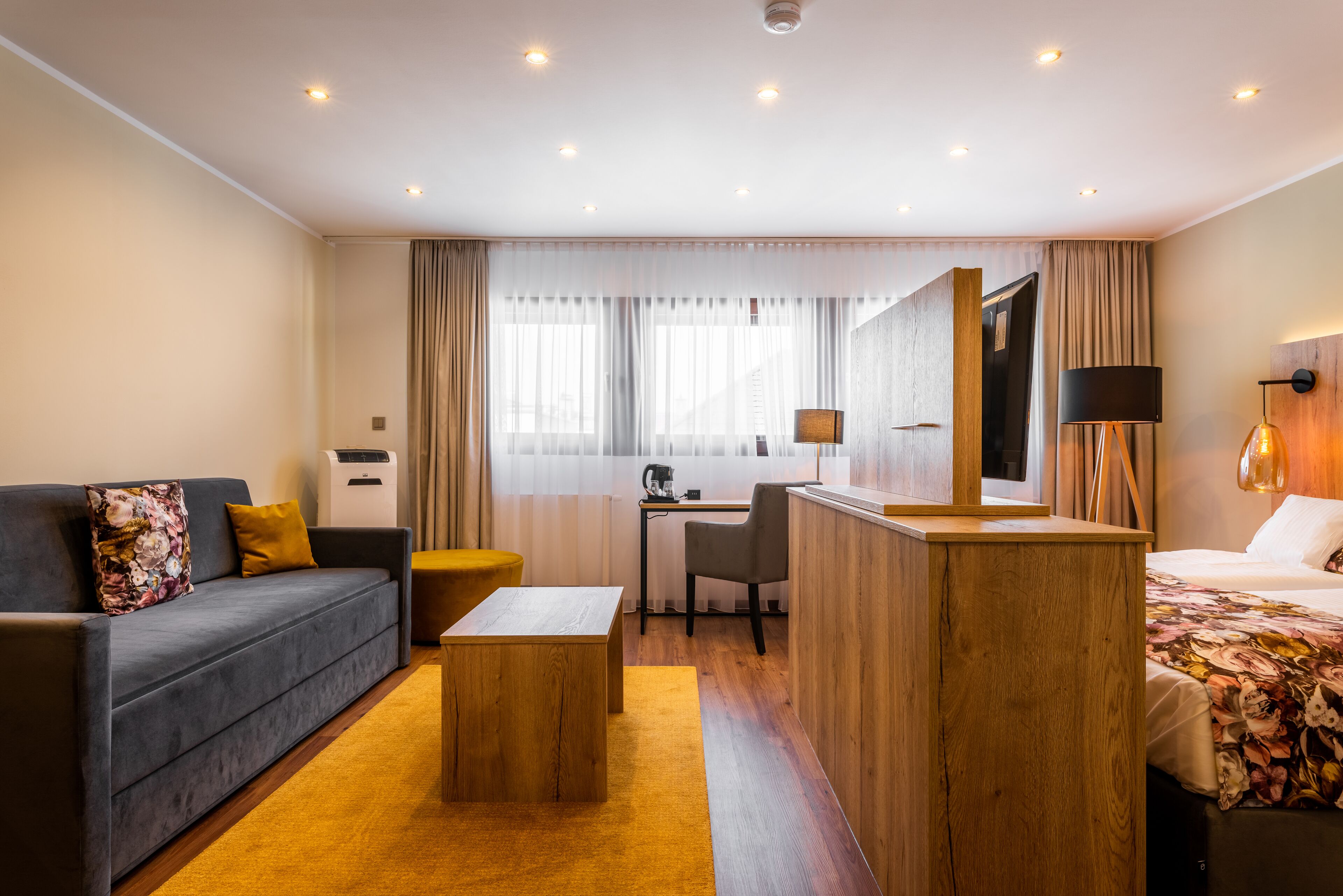 Superior-Doppelzimmer | Wohnbereich | Flachbildfernseher