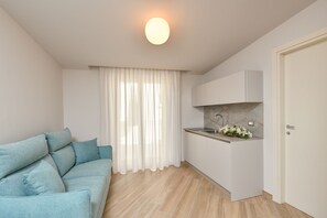 Habitación cuádruple Confort, baño privado (anticlea) | Cocina privada