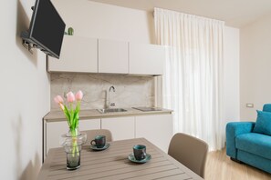 Habitación cuádruple superior, baño privado (itaca) | Cocina privada