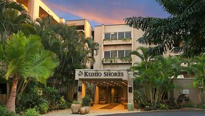 A hotel entrance with a sign reading "KUHIO SHORES". - A Beautiful Condo at the Waters Edge with a Great View (Koloa)