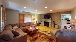 Smart TV, fireplace, DVD player, books