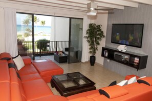Flat-screen TV, DVD player, books, music library - Stunning 2BR beachfront condo  (West Bay)