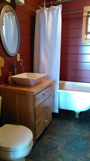 Combined shower/bathtub, hair dryer, towels, soap