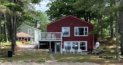 Maine Lakefront Cottage Rental with Sandy Beach
