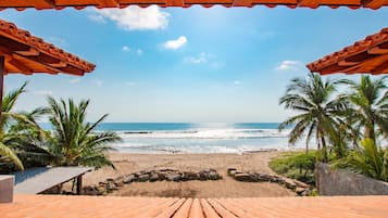 On the beach, sun loungers, beach towels