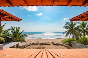 On the beach, sun loungers, beach towels