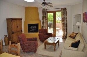 Smart TV, fireplace, DVD player, books