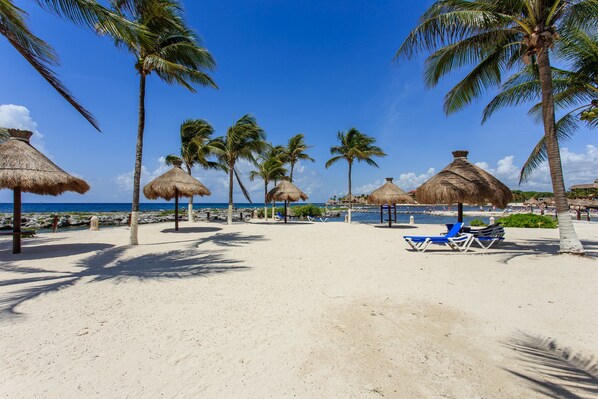 On the beach, beach towels