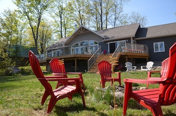 Large upper deck with table, chairs, sofa; lots of space to spread out.