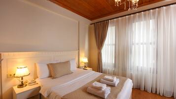 Ropa de cama de alta calidad y minibar