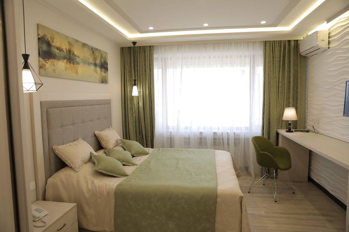 Double Room | Minibar, in-room safe, desk, blackout curtains
