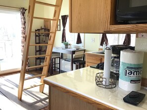 Fridge, microwave, stovetop, coffee/tea maker