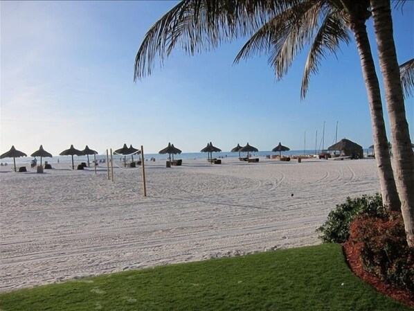 On the beach, sun loungers, beach towels