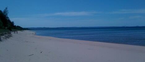 On the beach, sun-loungers