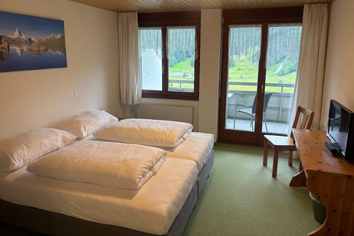 Doppel- oder Zweibettzimmer