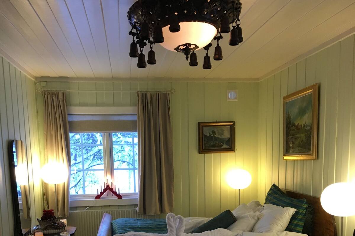 Economy Apartment, 1 Queen Bed, Garden View | Blackout drapes, iron/ironing board, WiFi (free), individually decorated