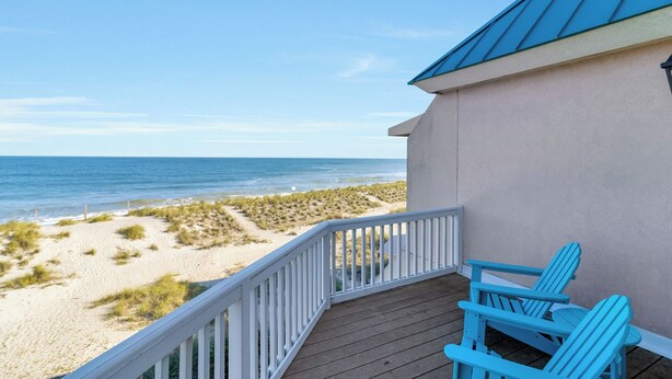 A balcony with a view of the beach and ocean. - Oceanview with Sunrise Views, Direct Beach Access & Hot Tub (Tybee Island)