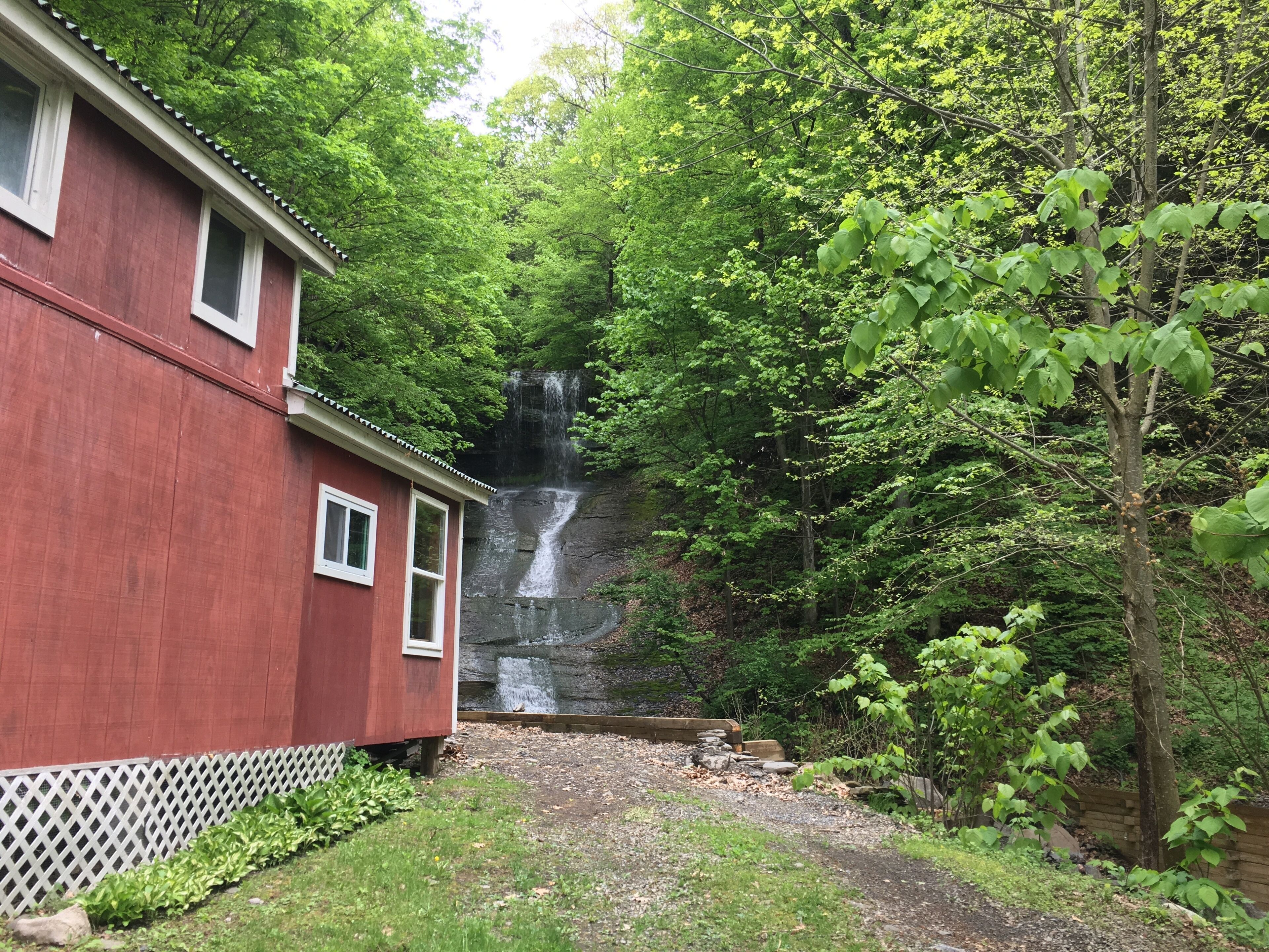 Cottage Overlooking Private Waterfall, 100 Yards From Level Beach.  1 BR w/ loft