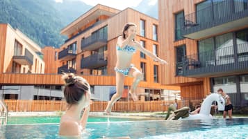 Outdoor pool, open 8:00 AM to 8:00 PM, pool umbrellas, pool loungers