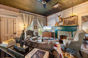 Smart TV, fireplace, DVD player, books