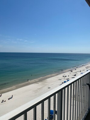 On the beach, sun-loungers