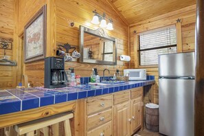 Fridge, microwave, coffee/tea maker, toaster