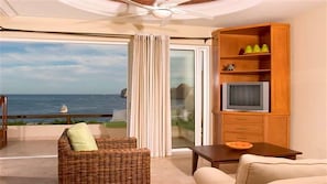 TV, fireplace - One Bedroom Executive Ocean front Guarantee  (Cabo San Lucas)