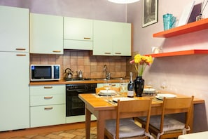 City Apartment, 1 Bedroom | Private kitchen | Full-sized fridge, microwave, oven, stovetop