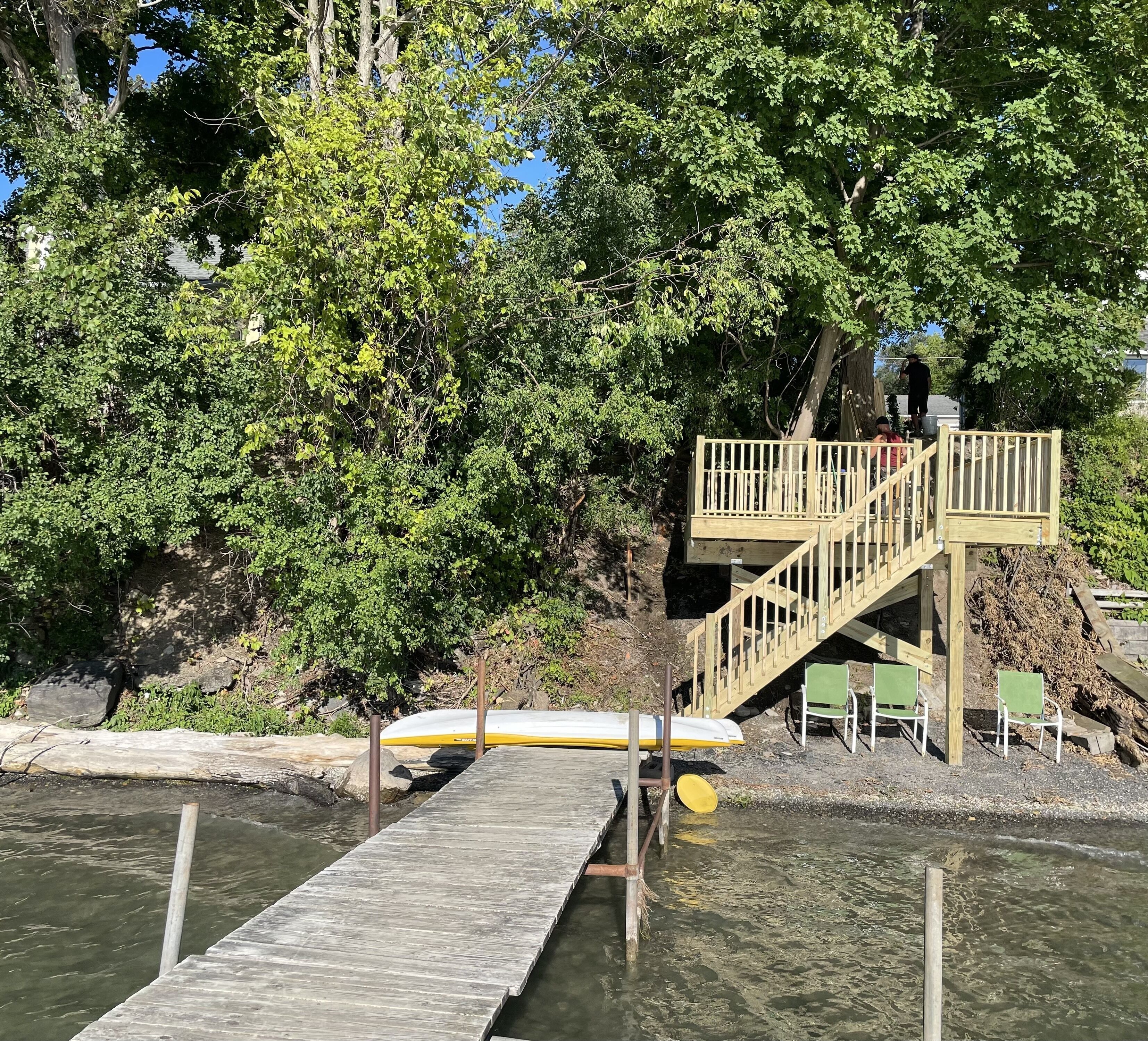 New deck and stairs overlooking lake and private beach