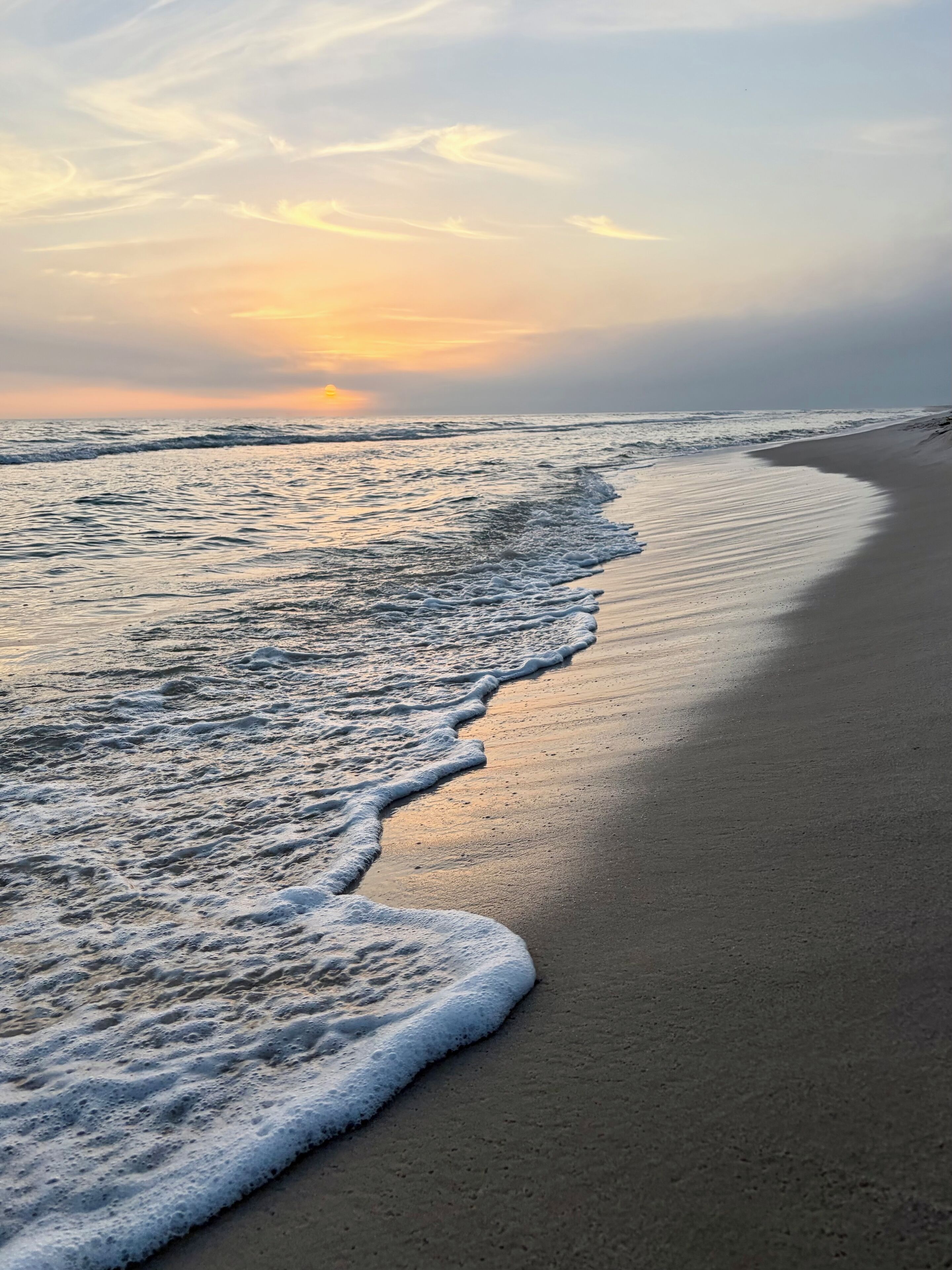 Nær stranden og solsenger