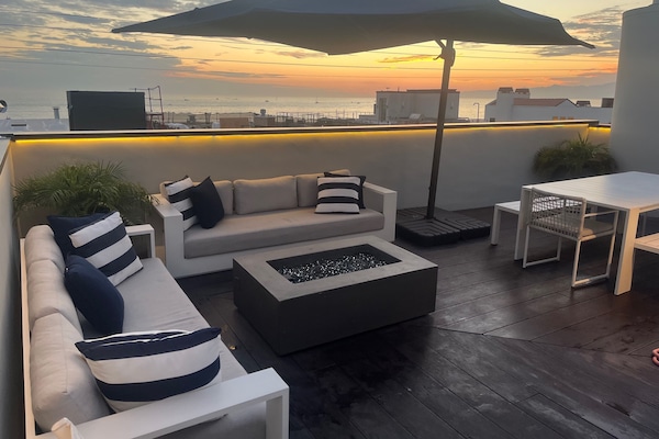 Rooftop Deck and fire pit.