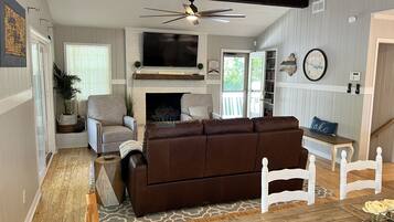 Smart TV, fireplace, DVD player, books