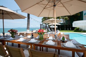 Outdoor dining - Casa La Playa, a 6 Bedroom FULLY STAFFED, MODERN BEACHFRONT VILLA,  Walk to Town (Puerto Vallarta)