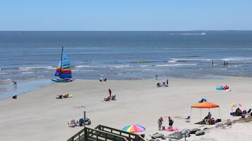 On the beach, sun loungers, beach towels