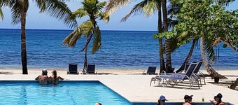 Family Friendly Beach Bungalow. Private Eco Dive Resort With A Pool & Beach