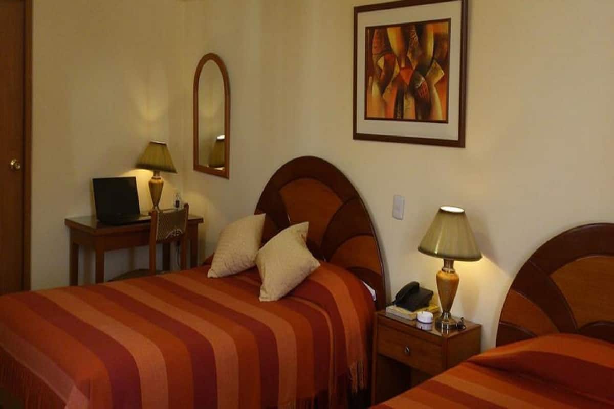 Twin Room, 2 Single Beds, Private Bathroom | In-room safe, desk, iron/ironing board, free WiFi