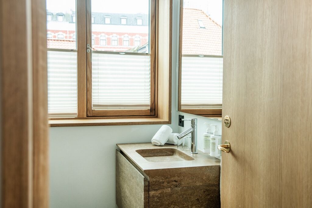 deluxe double room | bathroom | shower, hydromassage showerhead, designer toiletries, hair dryer